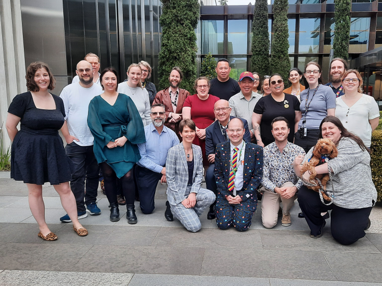 A photograph of attendees at the Public Sector Neurodiversity Community of Practice’s end of year gathering in 2024. 