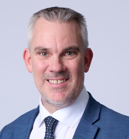 A head shot photograph of Mark Sawade, a member of the APS Digital Profession. 