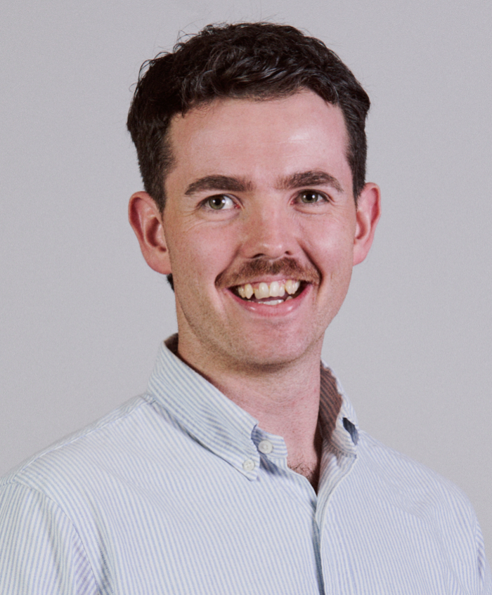 A head shot photograph of Noah Scanlon, a member of the APS HR Profession. 