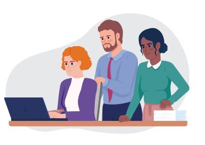 Illustration of three coworkers collaborating at a desk with a laptop and stack of papers, depicting teamwork in an office setting. The group includes a seated woman with curly orange hair typing, a standing man with a beard and tie observing, and a standing woman with dark hair and green sweater engaged in discussion.